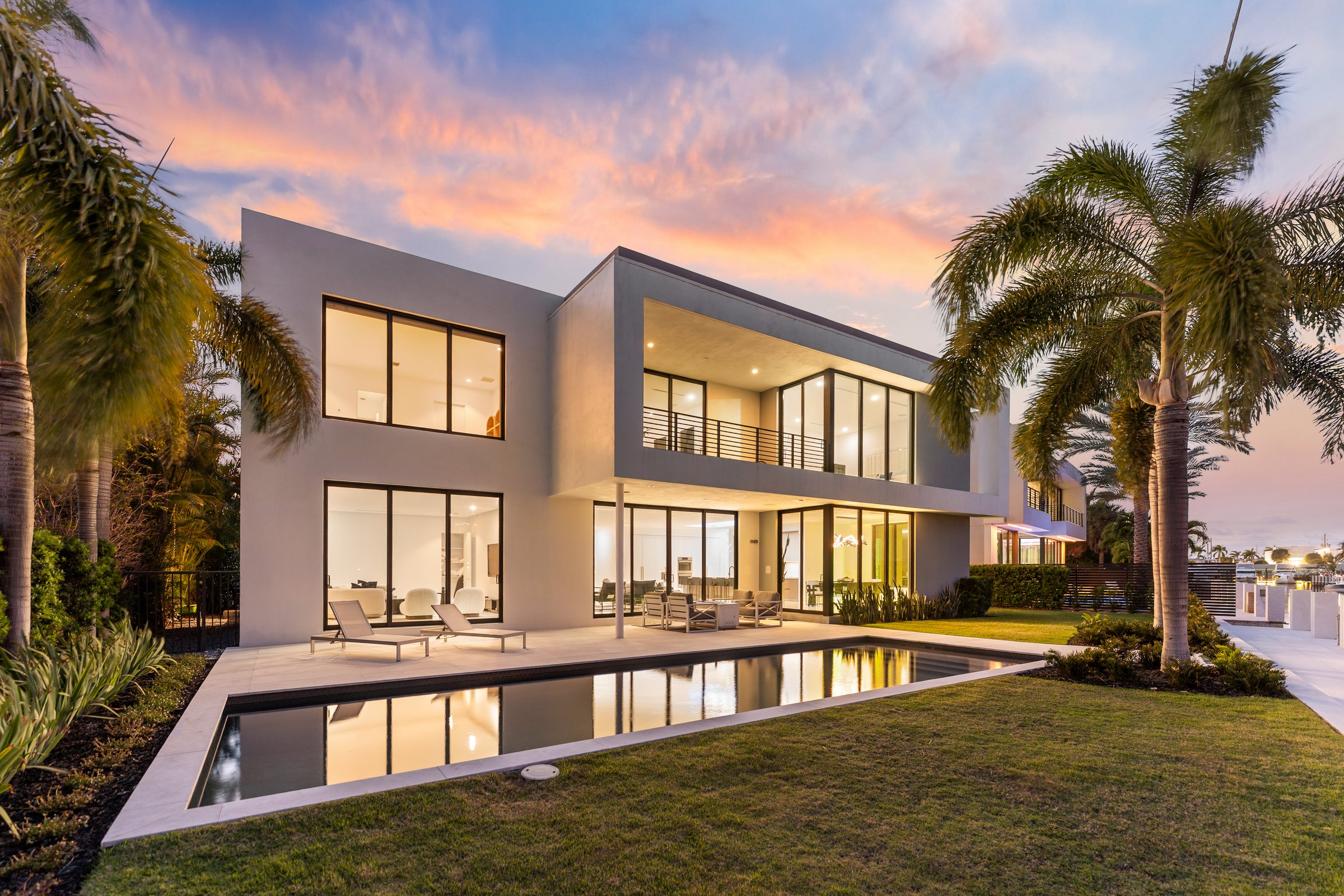 Rear Exterior at Twilight at Casa Aqua, 4232 E Tradewinds Ave, Lauderdale-by-the-Sea