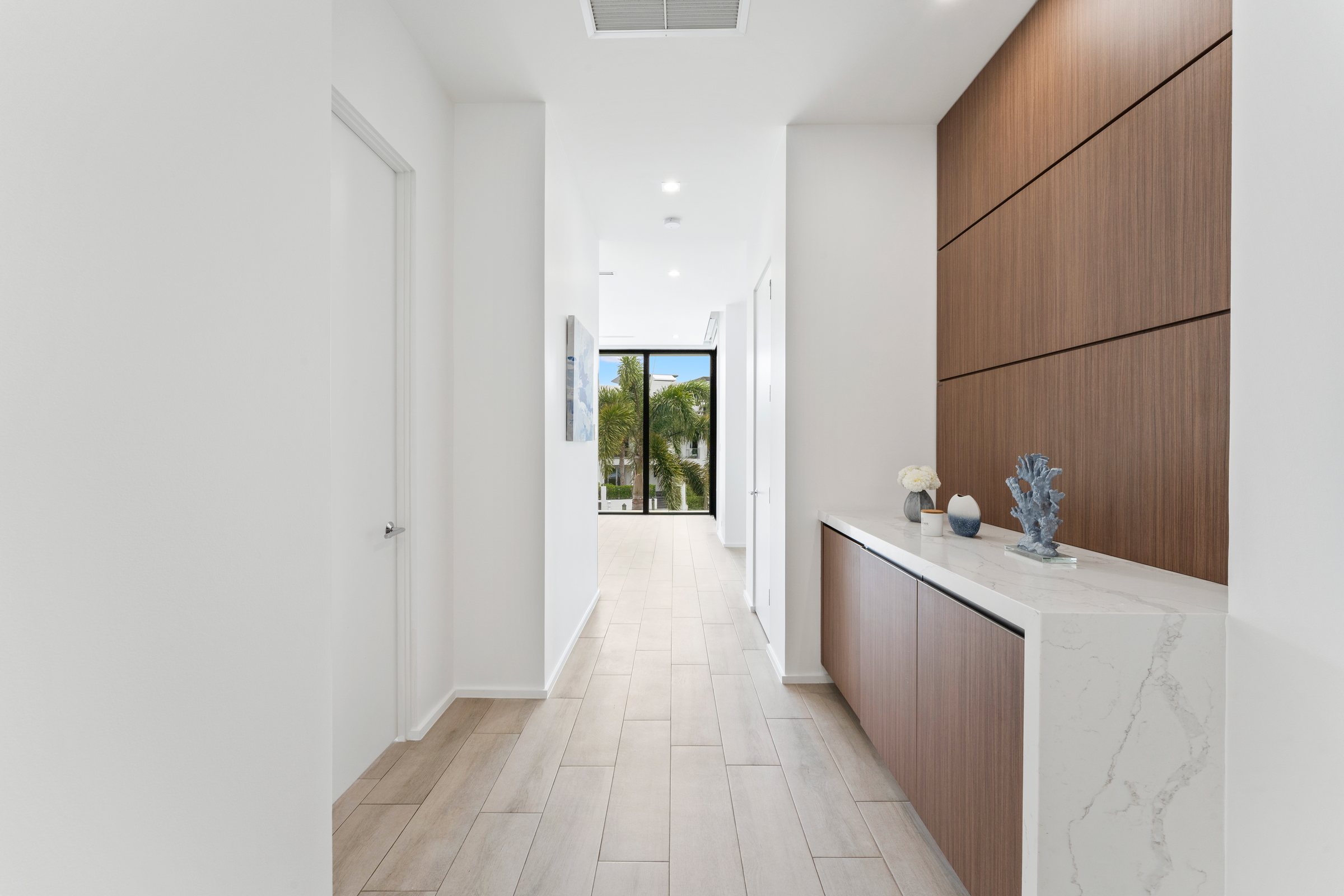 Hall with Built-in Cabinetry at Casa Aqua, 4232 E Tradewinds Ave, Lauderdale-by-the-Sea