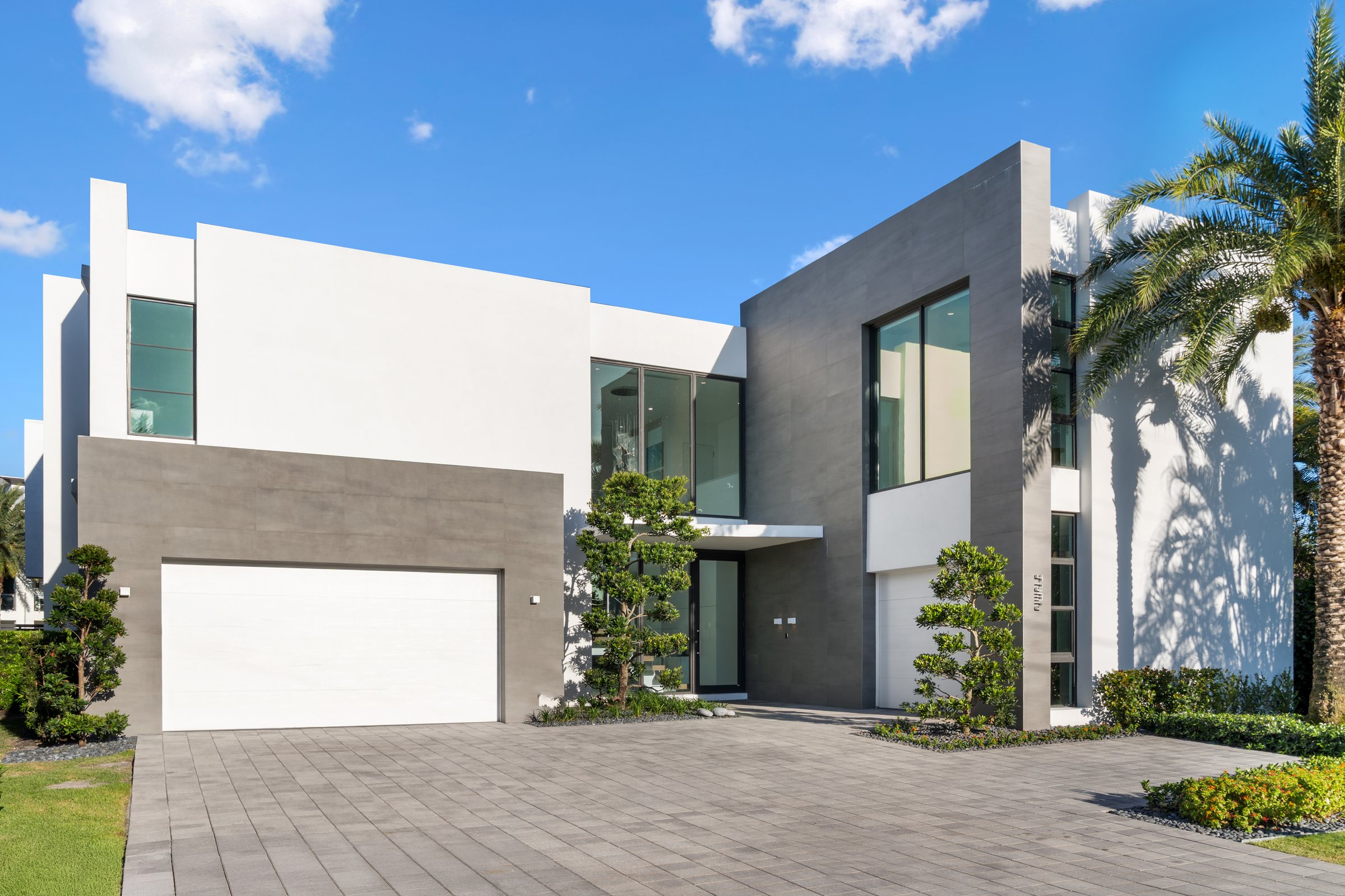 Driveway and Garage Elevation at Casa Aqua, 4232 E Tradewinds Ave, Lauderdale-by-the-Sea